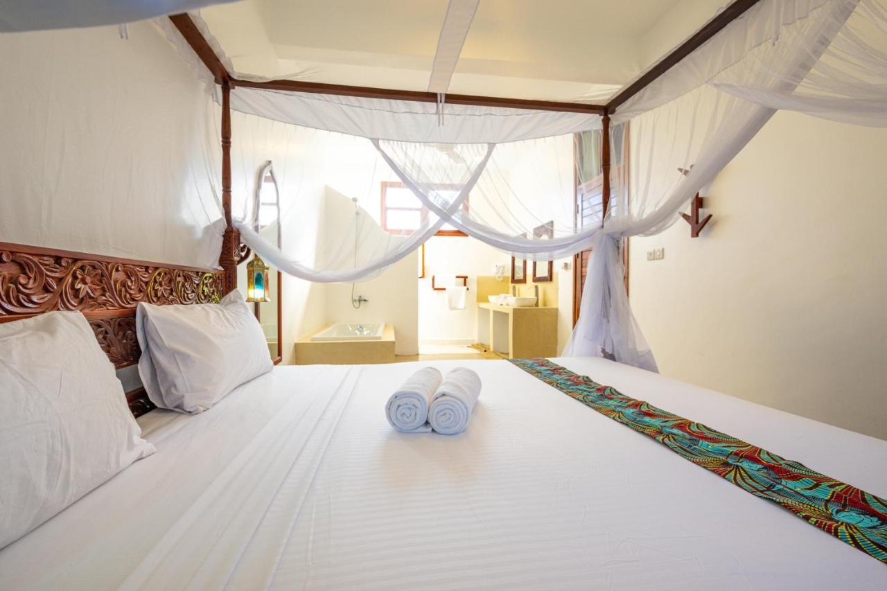 Tasneem Islamic Luxury Suites 江比阿 外观 照片