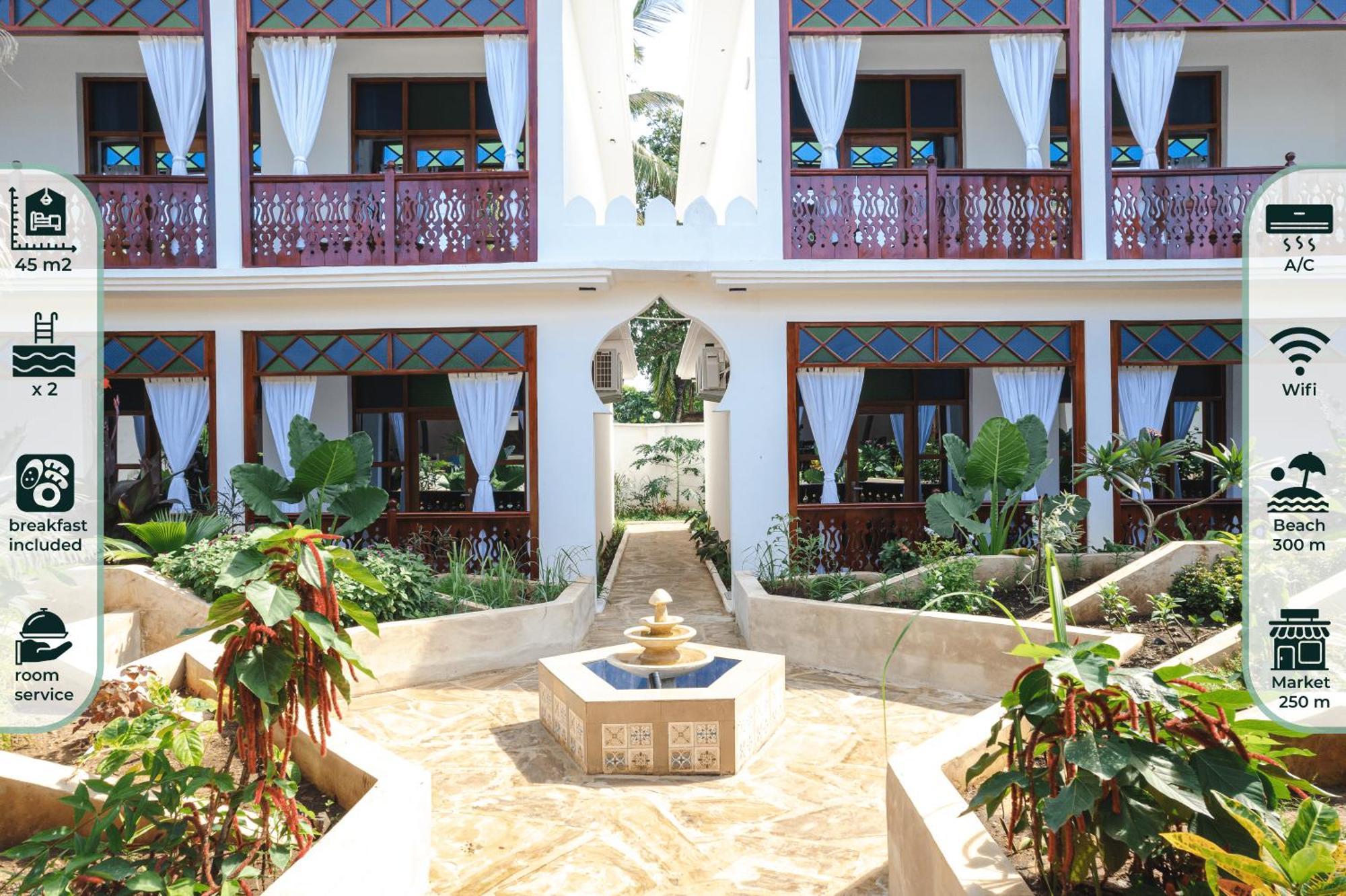 Tasneem Islamic Luxury Suites 江比阿 外观 照片