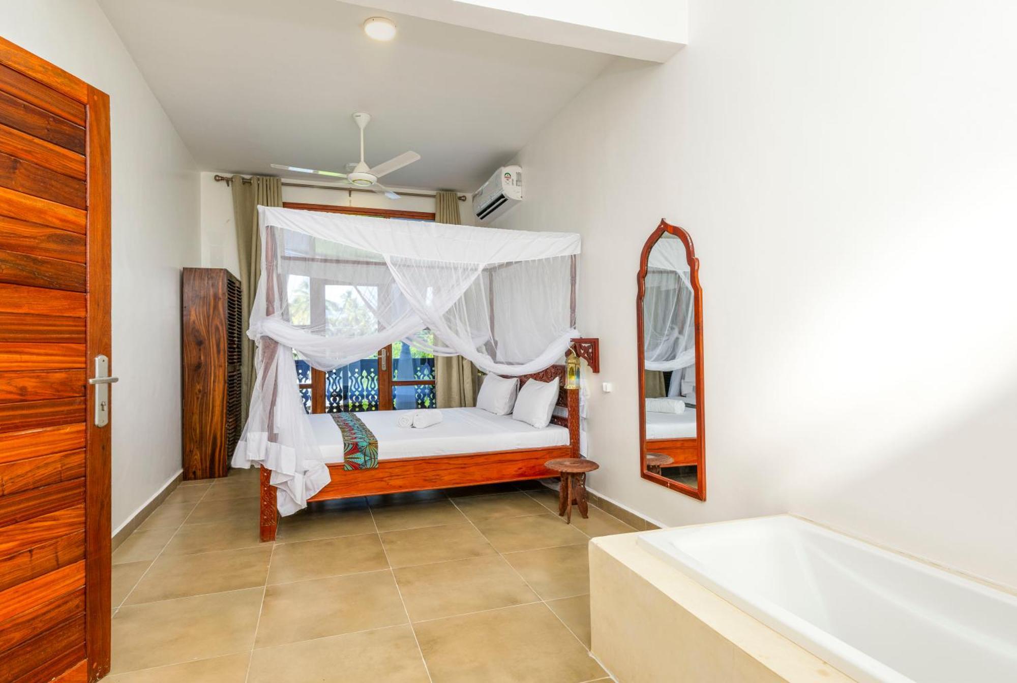Tasneem Islamic Luxury Suites 江比阿 外观 照片